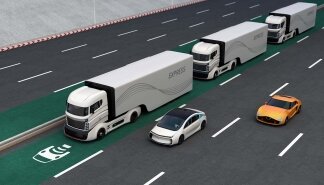 Fleet of autonomous hybrid trucks driving on wireless charging lane. 3D rendering image.
